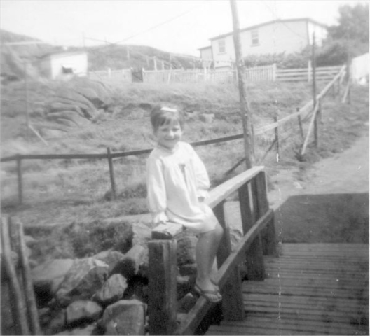 680: Winifred Kerrivan sitting on Reddy's bridge. J V McCarthy's house is in the background. (circa 1967) [courtesy of Jenny (Kerrivan) Harvie]  - Daughter of Joseph Kerrivan &amp;amp; Madeline Bennett